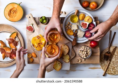 Flat-lay Of  Appetizers Table With Italian Antipasti Snacks. Family, Friends Holiday Gathering, Wine And Snacks Party. Brushetta Or Authentic Traditional Spanish Tapas Set Over Wooden Background. 