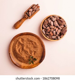 Flatlay Cocoa Beans, Cocoa Powder, Raw Chocolate On A Pink Background. The Concept Of Healthy Eating. 