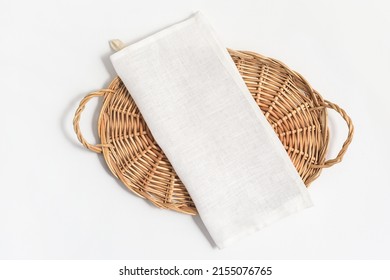 Flatlay Composition With Natural Linen Kitchen Tea Towel Or Napkin On Wicker Tray On White Background