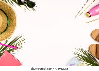 Flatlay with hat, sunglasses, notebook and summer shoes. Concept of holiday or vacation