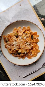 Flatlay Image Of Chicken Pasta With Parmesan And Brocolli