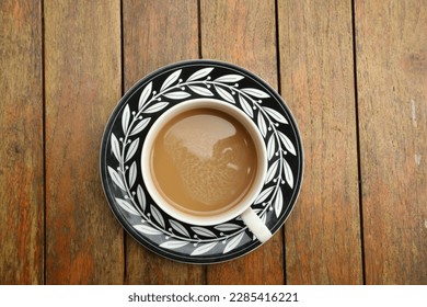 flatlay, A Mug of Coffee on a Wooden Table - Shutterstock ID 2285416221
