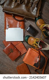 FlatLay Still Life Set Of Vintage Stylish Leather Items: Brown Shoes, A Laptop, A Notebook, Two Cases, A Briefcase And A Traveler's Bag