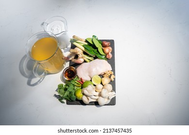 Flatlay And Toptable Of Ingredients Set Of Thai Food, Coconut Milk With Chicken Soup.The Ingredients Are Chicken Vegetable And Many Types Of Herbs Together Combine As A Great Dish.