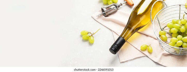 Flat-lay of white wine in glasses and corkscrews on a white background, top view, wide composition. Wine bar, winery, wine degustation concept. Panorama, banner, copy space. - Powered by Shutterstock