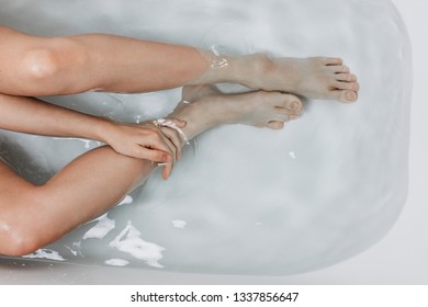 Flatlay Of Woman's Legs In The Bathtub, Self-care Concept