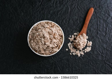 Flattened Rice Or Aval Used To Make Kerala Breakfast Ayal Upma Or Pohe On Dark Black Background Tamilnadu South India. Top View Of Indian Food Ingredients.