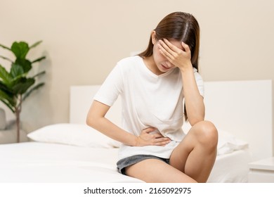 Flatulence Ulcer, Asian Young Woman, Girl Hands In Belly, Stomachache From Food Poisoning, Abdominal Pain And Digestive Problem, Gastritis Or Diarrhoea. Abdomen Inflammation, Menstrual Period People.