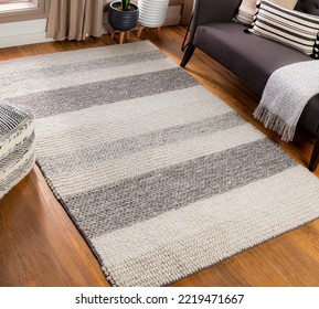 Flatweave stripe woven area rug. - Shutterstock ID 2219471667