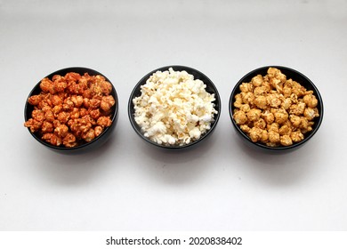 Flavored Popcorn: Natural, With Chili And With Caramel, Variety Of Snacks With Drinks Ready To See A Movie
