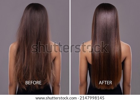 Flawless hair..thanks to her trusty flat iron. Rear view of a gorgeous young woman with long hair.