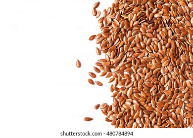 Flax seeds on white background