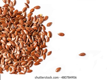 Flax seeds on white background