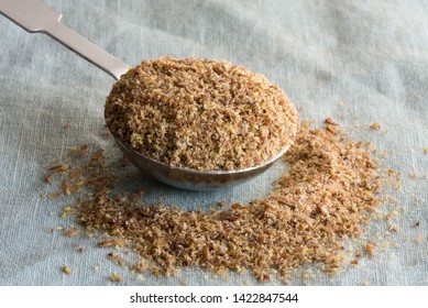 Flaxseed Meal Spilled From A Tablespoon