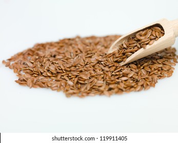 flaxseed on white background macro detail