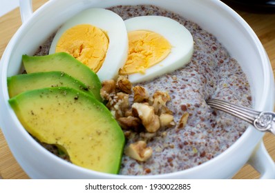 Flaxseed Porridge With Avocado And Egg. Detox Breakfast. Healthy Anti-age Porridge