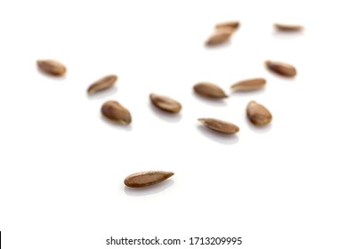 Flaxseed row organic nutrition background. Pile healthy Linseed or Brown Flax seed isolated on white. Antioxidant, omega-3, protein, mineral nutrients - vegetarian diet concept. - Shutterstock ID 1713209995