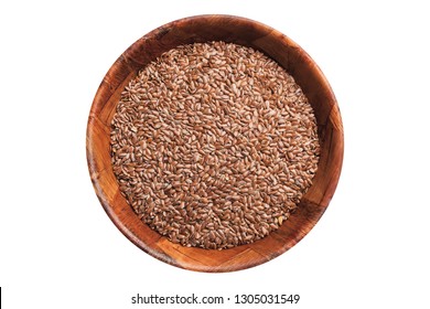 Flaxseed in wooden bowl isolated on white. Linseed food background with empty copy space for text design.