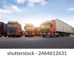 Fleet of Commercial Trucks Parked on Highway