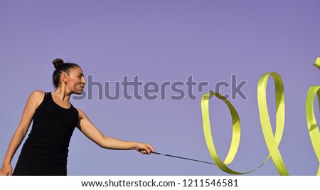 Similar – Close up side view profile portrait of one young middle age athletic woman shadow boxing in sportswear in gym over dark background, looking away