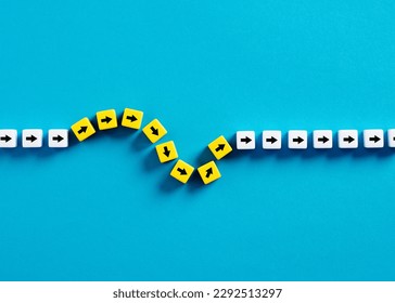 Flexibility and adaptation concept. Arrows on cubes following a flexible path. - Shutterstock ID 2292513297