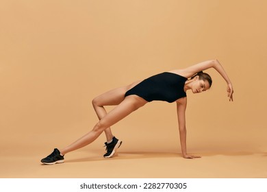 Fit Body of Beautiful, Healthy and Sporty Girl. Slim Woman Posing