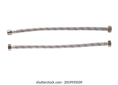Flexible liner for water supply on a white background. Close-up of flexible metal braided hose.