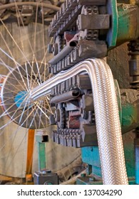 Flexible metal hose production line.Braiding machine taken closeup.