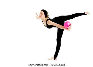 Flexible Slim Girl Doing Swallow Exercise With Ball