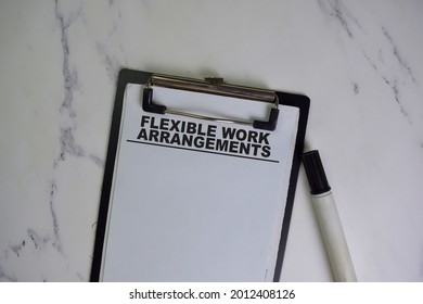 Flexible Work Arrangements Write On A Paperwork Isolated On Wooden Table.