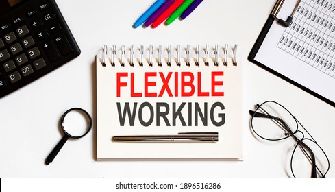 FLEXIBLE WORKING Text In The Office Notebook With Office Tools, Business