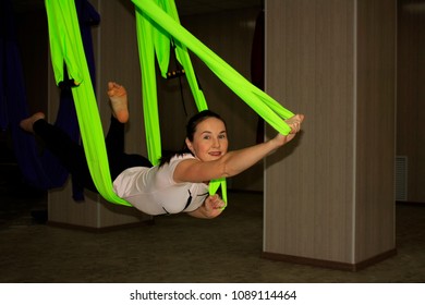 Flies Like Superman. Classical Yoga And Yoga In Hammocks.