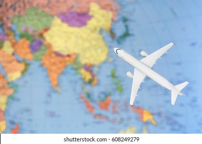 Flight To Asia Symbolic Image Of Travel By Plane Map.