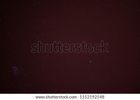 Flight of the comet C-2014 Q2 (Lovejoy) 13.01.2015 on the background of the M45 (Pleiades) Open cluster in the constellation of the bull