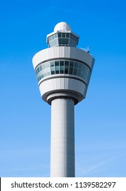 Flight control tower on blue sky background. Clear weather