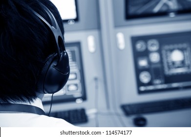 Flight Controller Working In The Flight Control Tower.