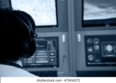 Flight Controller Working In The Flight Control Tower.