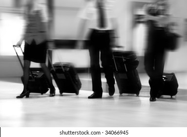 A Flight Crew Walking In The Airport