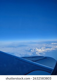 flight experience, airborne perspective, cloud watching, flight mode on, aerial photography, soaring above, airplane window view, exploring the world, flying over the ocean, sky high, jet wing, sky ho