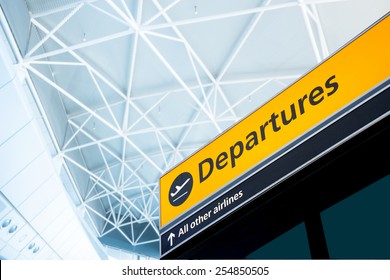 Flight information, arrival and departure board at the airport - Shutterstock ID 254850505