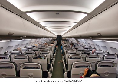 In Flight - Mar 21, 2020: The cabin of a British Airways airplane travelling from Madeira (FNC) to Gatwick (LGW) - the plane is G-GATH, an Airbus A320-232, built in 2001