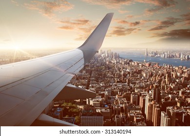 Flight over New York City - Shutterstock ID 313140194