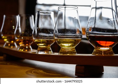 Flight Of Scottish Whisky, Tasting Glasses With Variety Of Single Malts Or Blended Whiskey Spirits On Distillery Tour In Scotland, UK