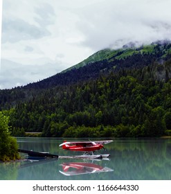 Flightseeing float plane rest at dock in Moose Pass, Alaska