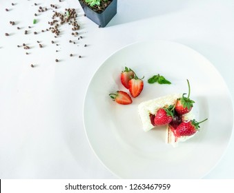 Flim Grain Strawberry Cake On White Plate. Top View-image, Free Copy Space.