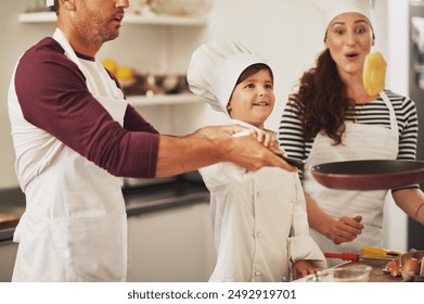 Flip, family and child with pancake in kitchen for growth development to prepare cookies in home. Father, mom or kid learning pastry tricks or games for bonding, cooking dessert or playing together - Powered by Shutterstock