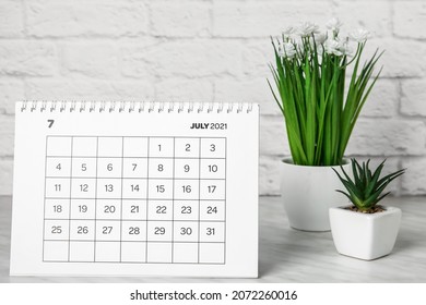 Flip Paper Calendar On Table