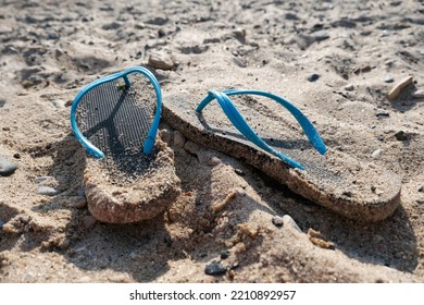 Flipflop Sandals On The Beach In A Sand, Travelling And Resort Concept