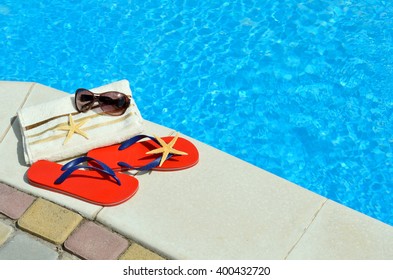 flipflops-sunglasses-towel-starfish-on-2