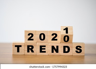 Flipping 2020 To 2021 Trends Print Screen On Wooden Block Cubes. New Idea Business Fashion Popular And Relevant Topics.